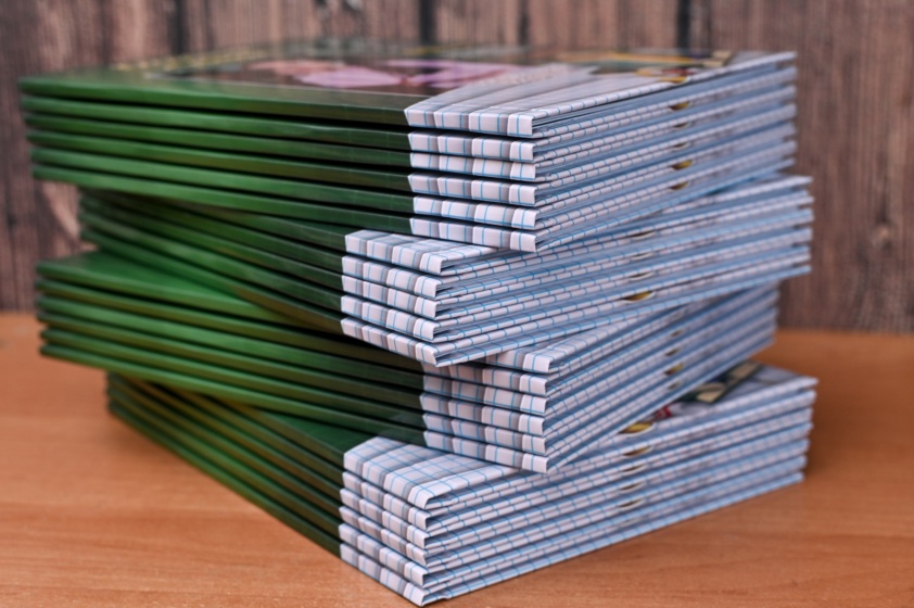 photo books stacked on the table.